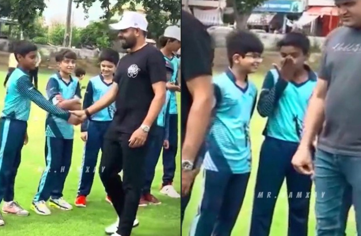 Young-fan-kisses-own-hand-after-handshake-Babar-Azam